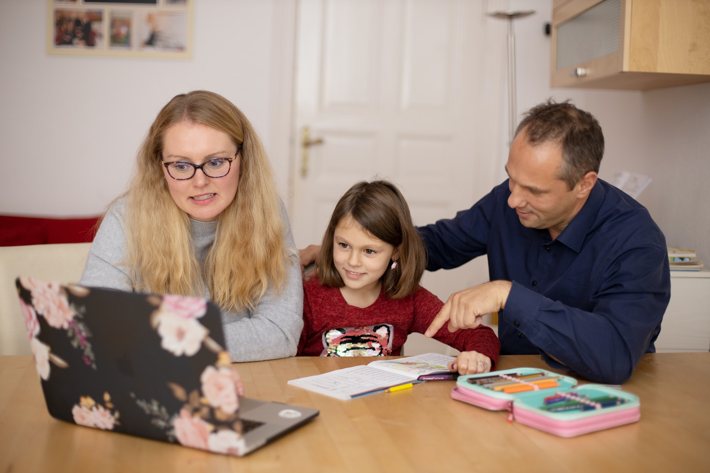 family doing school homework