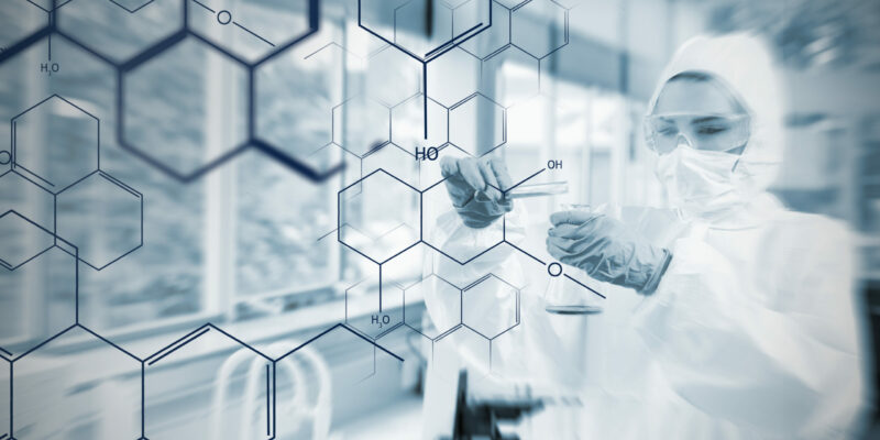 Chemist working cautiously with liquid helped by futuristic interface in soft focus effect Online Chemical Safety Awareness Training