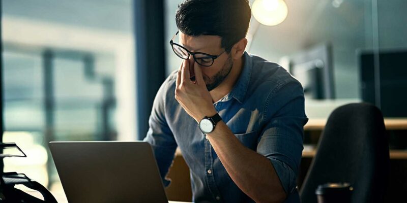 employee-suffering-work-related-stress Workplace Stress For Managers Training